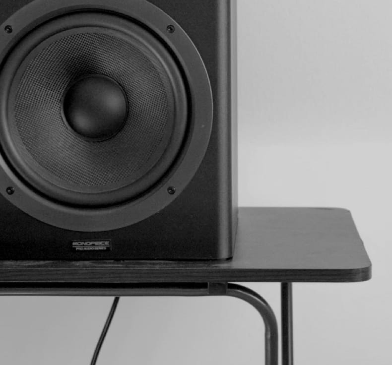 A black ZX7 speaker on the top of the table