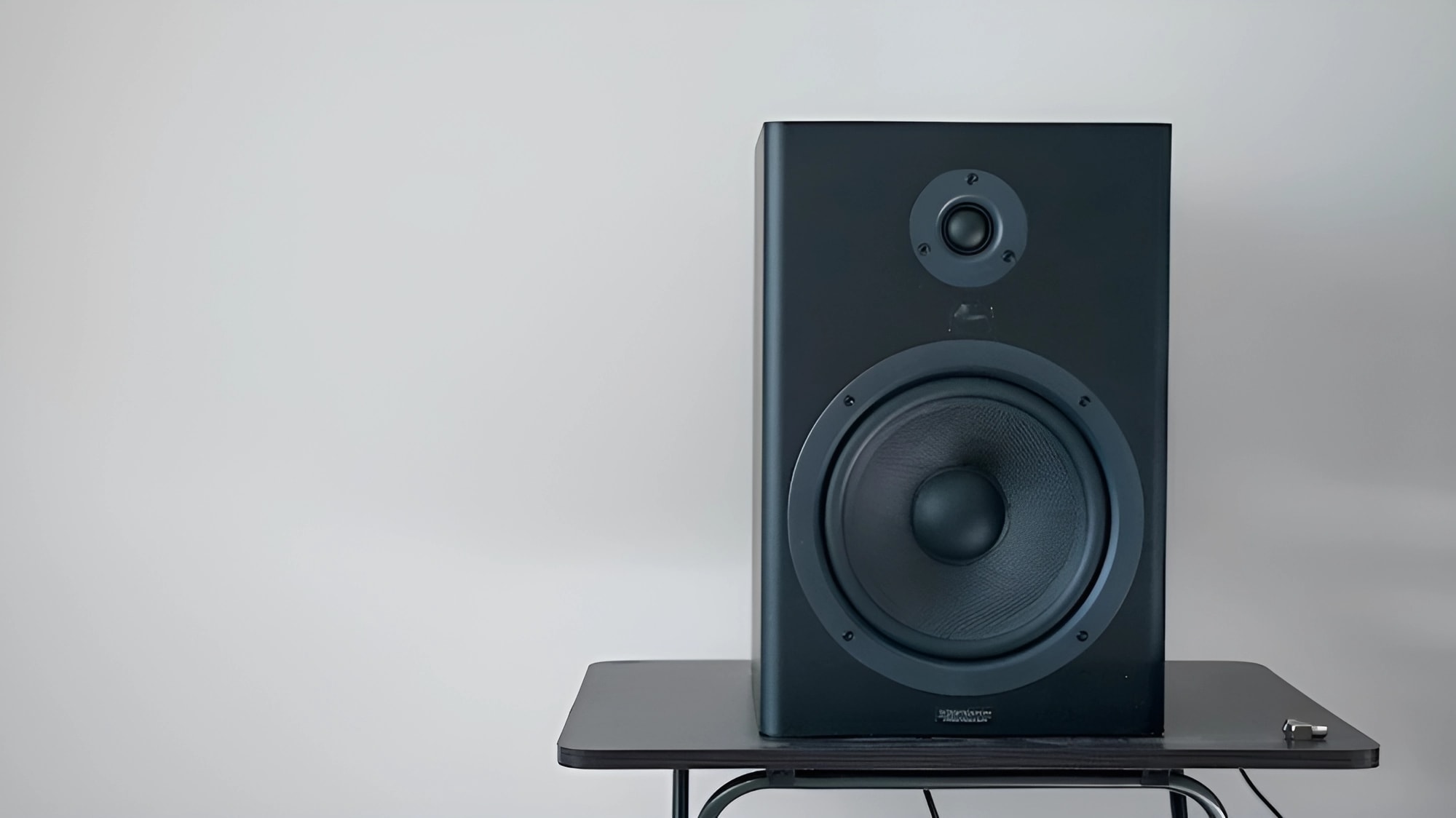 A black ZX7 Speaker on a table