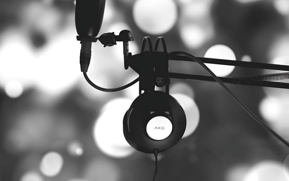 A black XX99 MARK I headphones on a mic stand